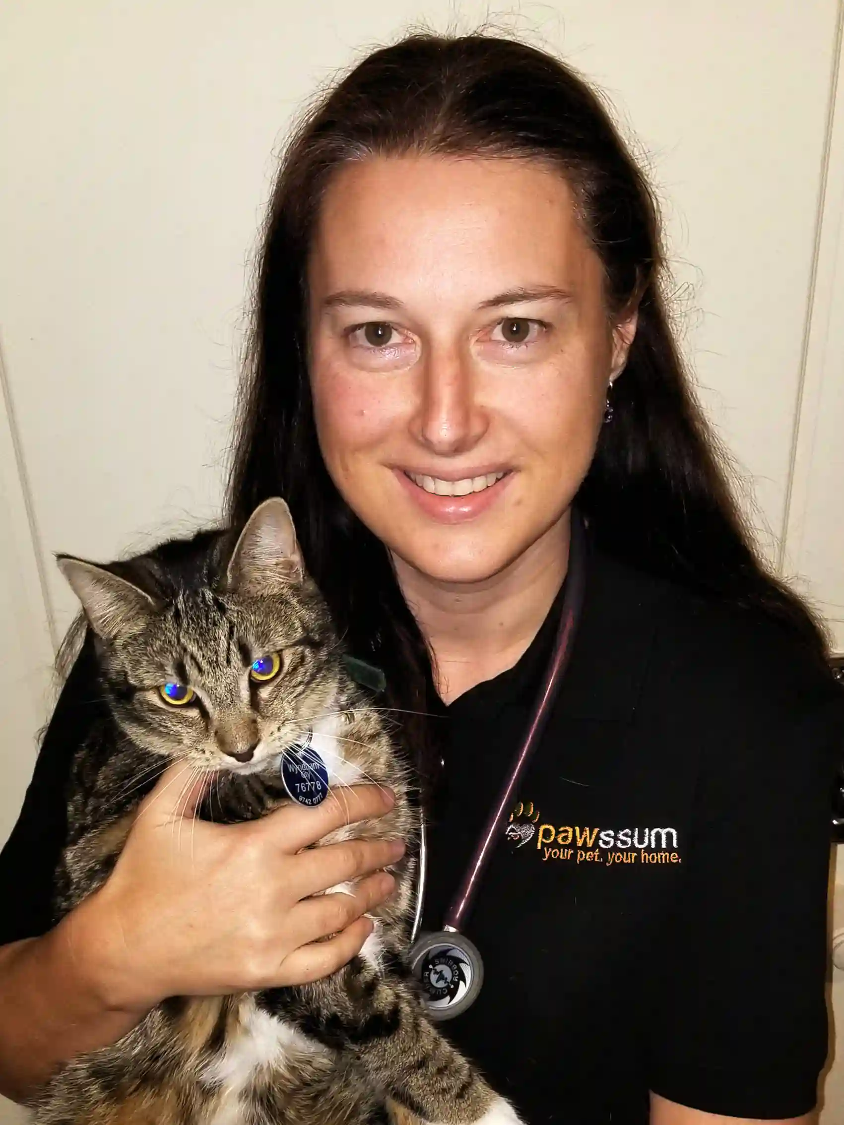 Dr. Meredith holding a cat